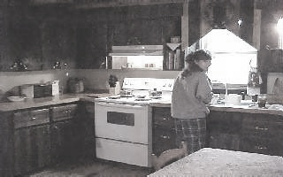 Sharon washing the same dish... over and over