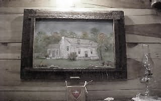 A painting our neighbor made for us that still hangs over the fireplace