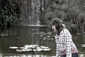 Sitting by the waterfall counting lily pads that had their lilies in bloom