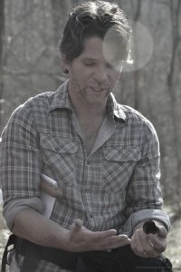 David Rasmussen foraging for wild edibles